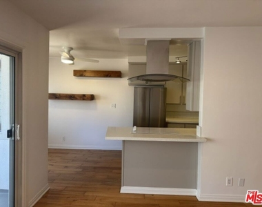 8710 Delgany Ave - Photo Thumbnail 17