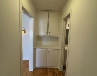 8710 Delgany Ave - Photo Thumbnail 13