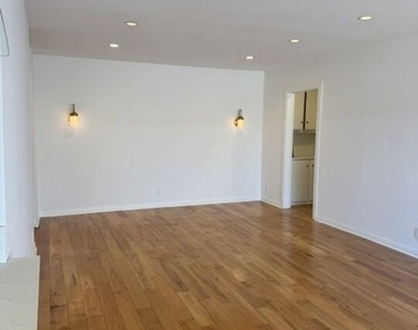 8710 Delgany Ave - Photo Thumbnail 5