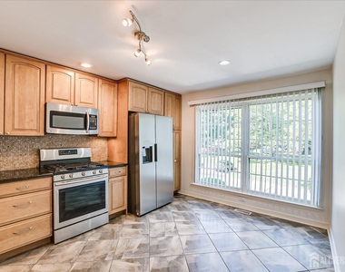 3902 Spring Brook Drive - Photo Thumbnail 7