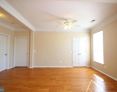 1550 Spring Gate Drive - Photo Thumbnail 2
