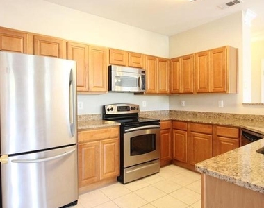 1550 Spring Gate Drive - Photo Thumbnail 4