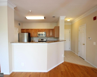 1550 Spring Gate Drive - Photo Thumbnail 3