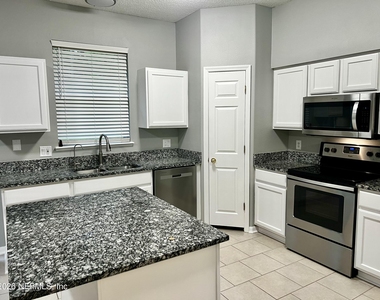10260 Woodley Creek Road W - Photo Thumbnail 10