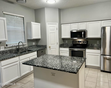 10260 Woodley Creek Road W - Photo Thumbnail 11