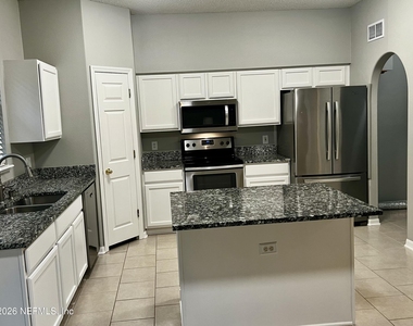 10260 Woodley Creek Road W - Photo Thumbnail 12
