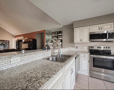 8706 Belle Glen Drive - Photo Thumbnail 3