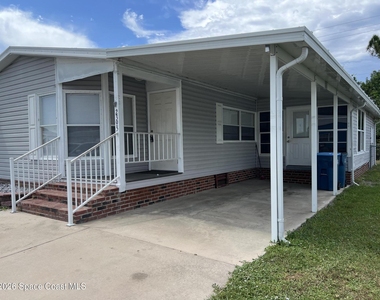 2395 Coconut Palm Drive Ne - Photo Thumbnail 1