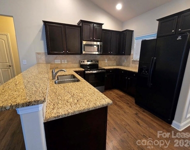 7231 Kenyon Drive - Photo Thumbnail 3
