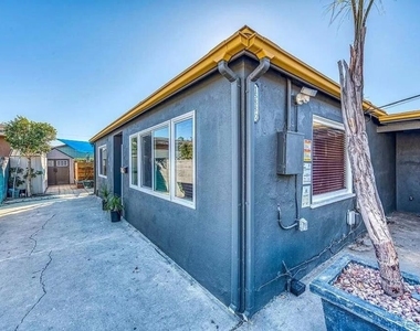 1588 1/2 W 36th Street - Photo Thumbnail 2