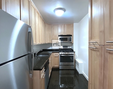 East 49 Street - Photo Thumbnail 1