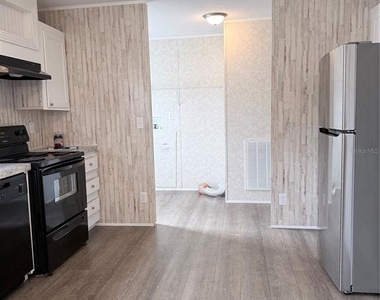 932 Se 40th Place - Photo Thumbnail 4