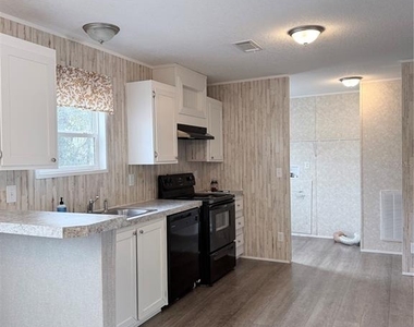 932 Se 40th Place - Photo Thumbnail 3