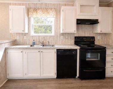 932 Se 40th Place - Photo Thumbnail 1