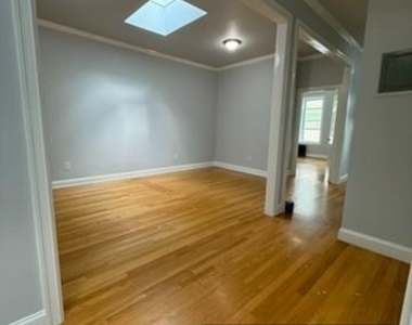 87-16 91st Avenue - Photo Thumbnail 2