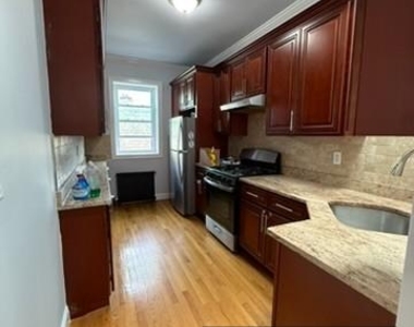 87-16 91st Avenue - Photo Thumbnail 7