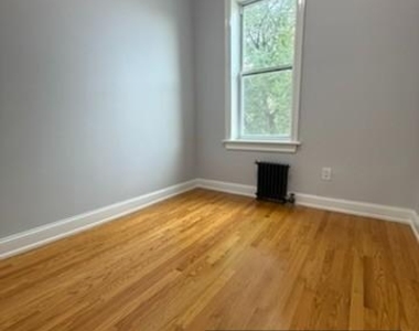 87-16 91st Avenue - Photo Thumbnail 13