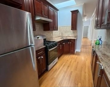 87-16 91st Avenue - Photo Thumbnail 5