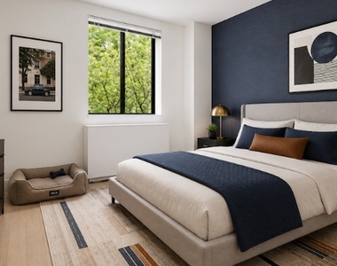 410 W 53rd St - Photo Thumbnail 1