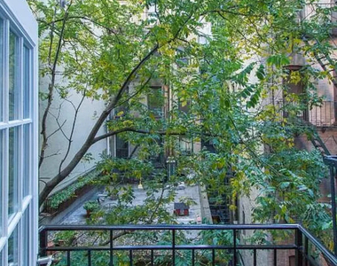 East 5 Street - Photo Thumbnail 3