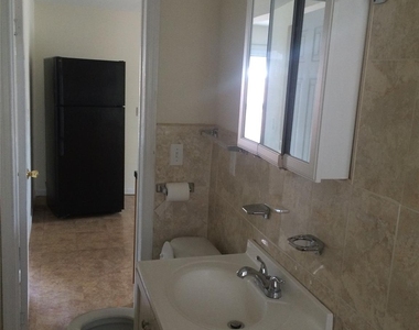 143-22 94th Avenue - Photo Thumbnail 3