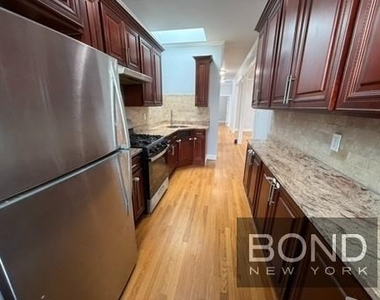 87-16 91st Avenue - Photo Thumbnail 1