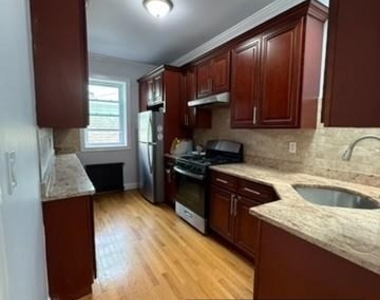 87-16 91st Avenue - Photo Thumbnail 9