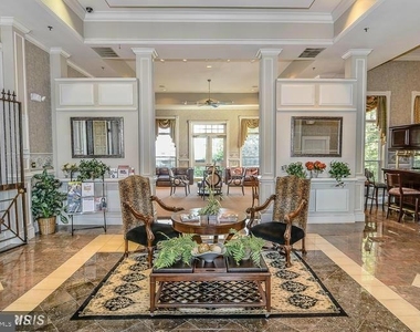 1580 Spring Gate Drive - Photo Thumbnail 3