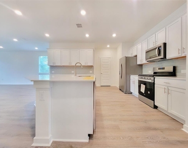 7501 Wheatgrass Path - Photo Thumbnail 3