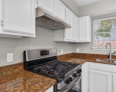 7601 Windrush Dr - Photo Thumbnail 15