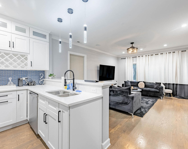 4634 S Langley Avenue - Photo Thumbnail 1