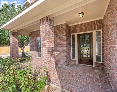 10003 Lynette Falls Drive - Photo Thumbnail 2