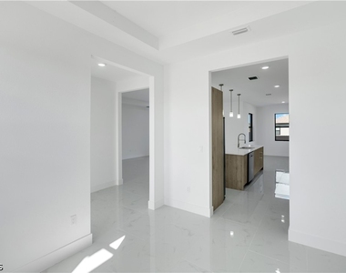 1144 Edelweiss Street E - Photo Thumbnail 6