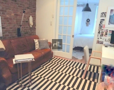 E 7th St. - Photo Thumbnail 3