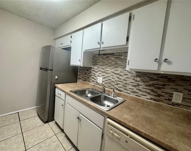 5503 Pokeweed Court - Photo Thumbnail 1