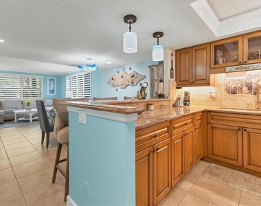 8776 Midnight Pass Road - Photo Thumbnail 11