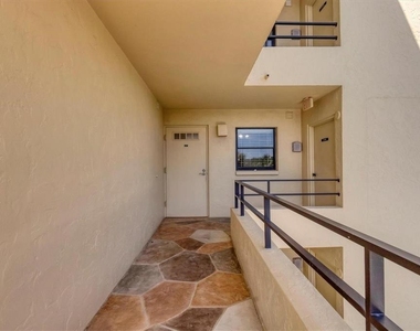 8776 Midnight Pass Road - Photo Thumbnail 2