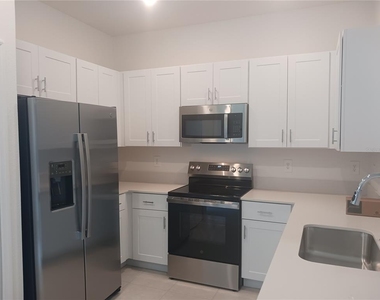 8607 Tropical Aire Lane - Photo Thumbnail 2