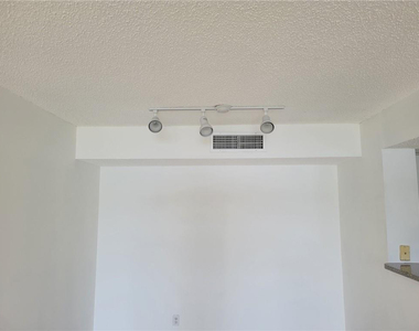 5005 Wiles Road - Photo Thumbnail 12