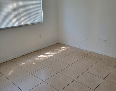 5005 Wiles Road - Photo Thumbnail 15