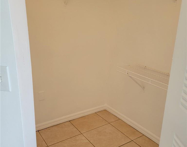 5005 Wiles Road - Photo Thumbnail 11