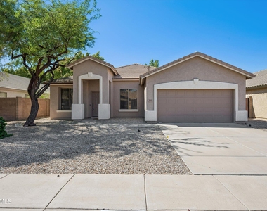 9161 W Salter Drive - Photo Thumbnail 2