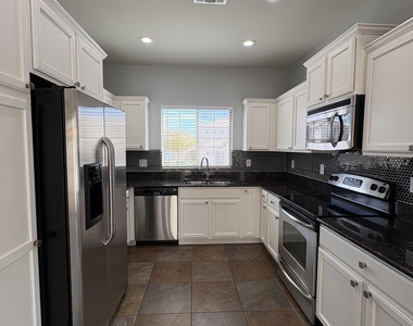 5396 W Molly Lane - Photo Thumbnail 12