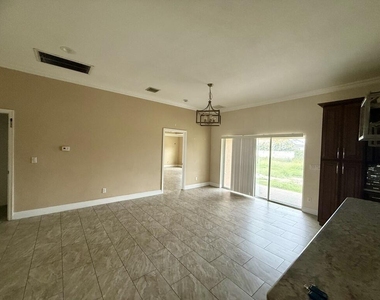 4417 Sw Baturro Street - Photo Thumbnail 2