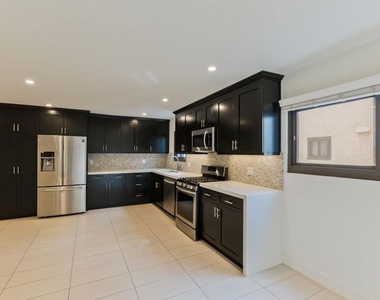 6930 De Celis Place - Photo Thumbnail 4