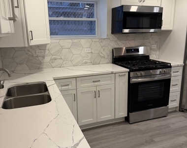 8106 S Langley Avenue - Photo Thumbnail 2