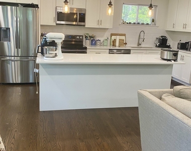 8816 Kenton Avenue - Photo Thumbnail 2