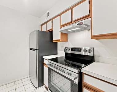 6109 Knoll Wood Road - Photo Thumbnail 2