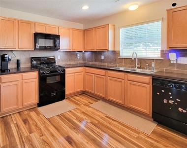 7726 Sagemark Ridge Drive - Photo Thumbnail 8