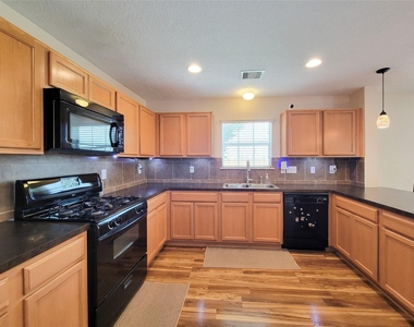7726 Sagemark Ridge Drive - Photo Thumbnail 7